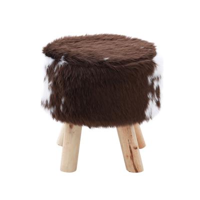 China Modern Home Decoration Soft Small Pouf Seat Four Wooden Legs Round Ottoman Stool for sale