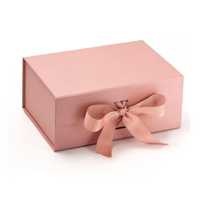 China Recyclable Custom Pink Gift Packaging Collapsible Magnetic Gift Box With Ribbon Closure Paper Box Packaging Box for sale