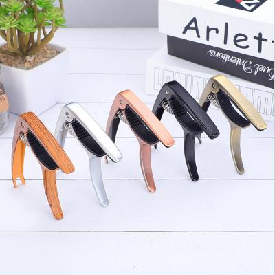 China GUITAR Riser Clip Guitar Capo Accessories Double Guitar Clip Folk Music Adjustable Adjustable Zinc Alloy Guitar Clip for sale