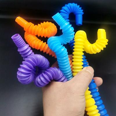 China Factory Supply PP Mini Educational Telescopic Corrugated Plastic Healthy Sensory Toys POP Tubes for sale