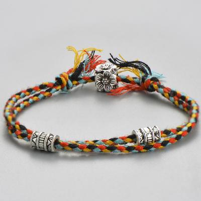 China Charm Bracelet Bohemia Multicolor Rope Braided Bracelets & Bangles For Women Men Chic Tibetan Silver Flower Bead Bracelet Jewelry for sale