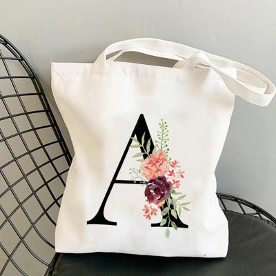 China Large Capacity Flower Letter Women Handled Single Shoulder Canvas Shopping Bags for sale