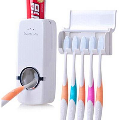 China Viable Factory Wholesale Custom Logo Wall Mounted Plastic Automatic Toothbrush Holder and Toothpaste Dispenser for sale