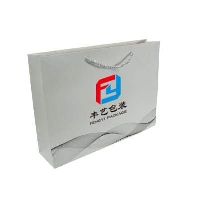 China Handmade Apparel Shoes Packaging Wholesale Luxury White Paper Bag Cardboard Wedding Gift Bags With Handle Bag for sale