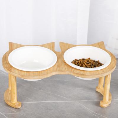 China Sustainable Wooden Pet Bowl for Cats and Small Dogs, High Dog Cat Food and Water Bowl Holder Bamboo Feeder with 2 Ceramic Bowls for sale