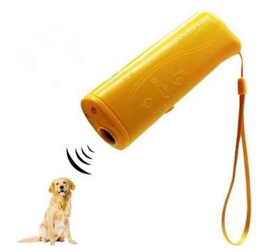 China Viable Ultrasonic Dog Dog Pet Repellent Trainer With Flashlight Anti Bark Device Pet Reflector for sale