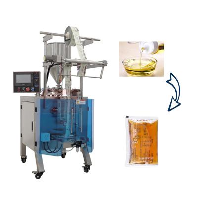 China Automatic Food Edible Oil Packing Machine Peanut Oil Packing Machine Sesame Oil Packaging Machine Into Small Bags for sale