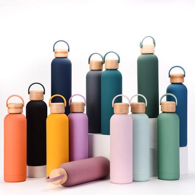 China PORTABLE Custom Logo 350ml Stainless Steel Water Bottle With Wooden Handle Lid Insulated Thermos Bottle for sale