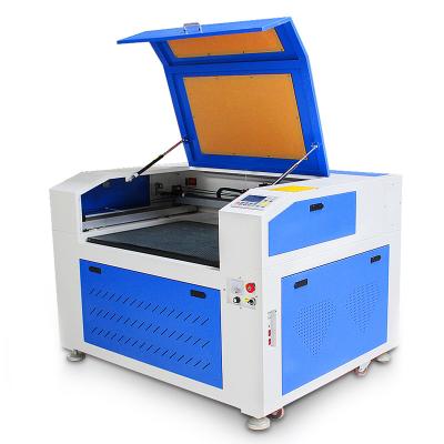 China Laser Engraving CO2 Laser Cutting Machine 6090 fst for Plastic Acrylic Cutting Engraving Cake Topper Best Price for sale