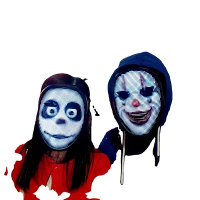 China Festival Celebration RGB Waving Gesture Sensing APP Programmable Face Changing LED Display Masks Clown Halloween Decoration for sale