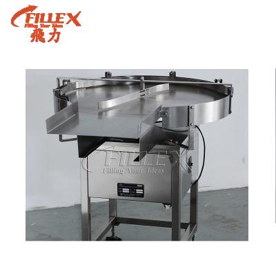 China Tin Can Sorter Water Beverage Feeding Filling Line Fire Resistant Semi Automatic Bottle Unscrambler Turntable Bottle Filling Machine for sale