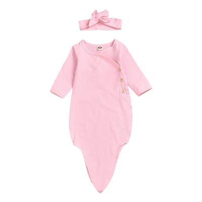 China Breathable Solid Infant Toddler Clothing Cotton Sleep Knot Pink Baby Dresses With Headband for sale