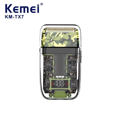 China KM-TX7 Twin Blade Hot Sale Transparencies Body Camouflage Printed Waterproof 2022 Men Electric Shaver for sale