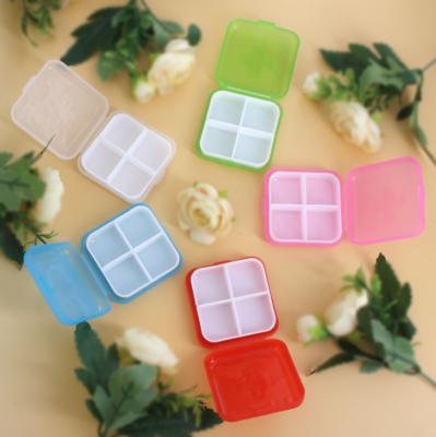 China Lightweight And Convenient Cross Shaped Pill Box 4 Funny Faces Pill Box for sale