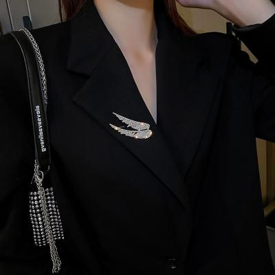 China Wholesale Trendy Rhinestone Crystal Angle Wing Korean Brooch Bulk Fashion for sale