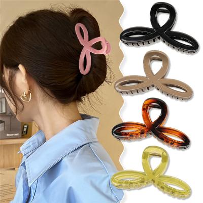 China Hot Selling Geometric Hair Claw Accessories Solid Color Plastic Hair Claw Clips 9cm Fashion Big For Women for sale