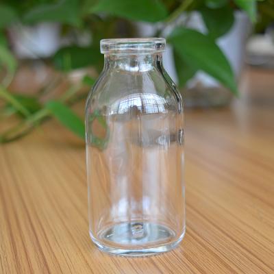 China Clear 100Ml Pharmaceutical Molded Borosilicate Glass Shell Injectable Infusion Vials for sale