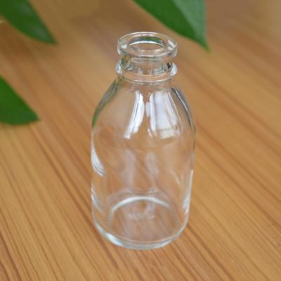 China Low Price 100Ml Borosilicate Glass Potion Vials Pharmaceutical Transparent Bottle for sale