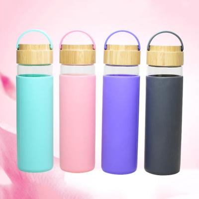 China Sustainable Outdoor Bicycle Single Wall Multicolor Glass Water Bottle With Swing Top for sale