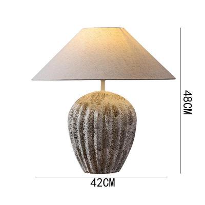 China Lighting Functions Japanese design clay pot lamp hotel bedroom engraved art retro ceramic table lamp linen bedside reading lamp for sale