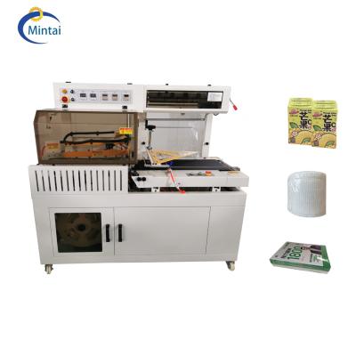 China machinery & Automatic Sealing Type Candle Magazine Sauce Mineral Water Bottle Plastic Packaging Equipment Tunnel Machinery for sale