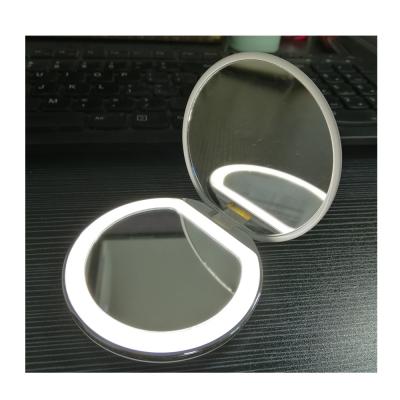 China LED Lighted Portable Mirror For Makeup With Small Light Handheld Mirror Foldable Mirror USB Charging for sale