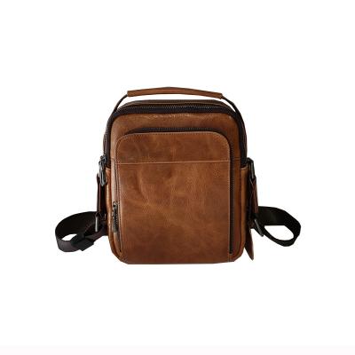 China 2021 new men's daily life shoulder bag diaper bag small business casual messenger cowhide leather vertical man bag main bag for sale