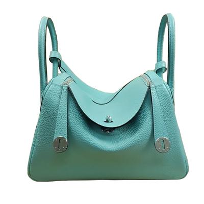 China Newspaper used custom logo fashion large capacity woman bag candy color lady style lady genuine hard leather handbag for sale