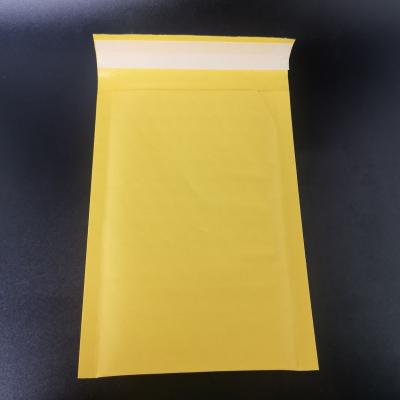 China Yellow Express Shipping Packaging Paper Bubble Wrap Bag Garment Packing Bag Printing Foam Thickened Shockproof Bag for sale