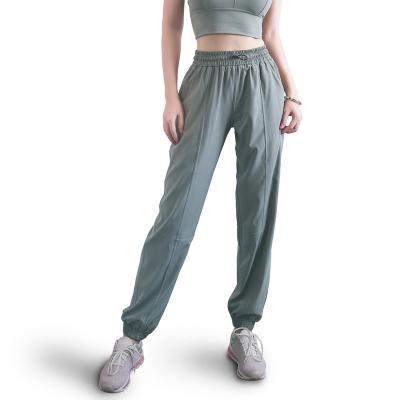 China Yoga Splice Sports Hip Breathable Fitness Loose Running Pants Women Quick Dry Clothes for sale