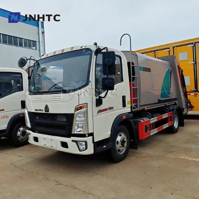 China HOWO Mülltransporter 4X2 5CBM 105CBM Müllkompakter Mülltransporter zu verkaufen