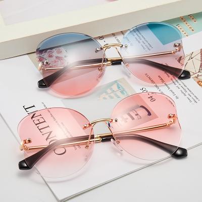 China UV-400 progressive change kids sunglasses uv400 frameless sunglasses for sale