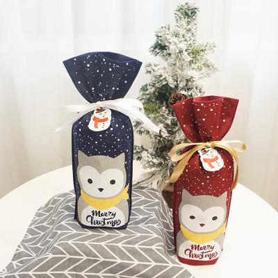 China Christmas Party Disposable Decoration Bag Colorful Drawstring Gift Non Woven Bag Beautiful for sale