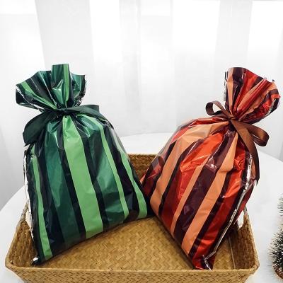 China Christmas Disposable Ribbon Plastic Cpp Gift Packaging Bag For Gift Package for sale