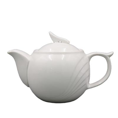 China Sustainable classic white porcelain teapot with embossed streamlines and special hander and lid for sale