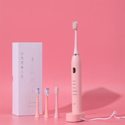 China Battery Operated Rechargeable Pink Durable Minimalist Whitening Battery Sonic Electric Toothbrush for sale