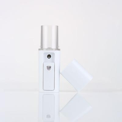 China Low moq low moq mini electric handheld handheld electric gun mini facial moisturizer atomizer mist sprayer for sale