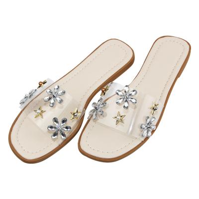 China Fashion Trend Manufacturers Beige PVC Flower Slippers Wedges Flat Women's Sandals for sale