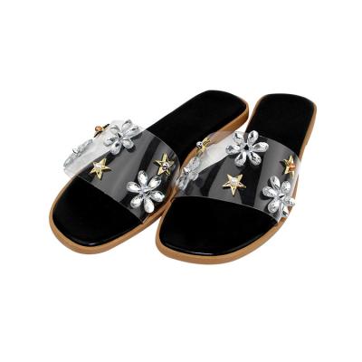 China Fashion Trend China Factory Supply PVC Black Flower Slippers Flat Shoes Women's Sandals for sale