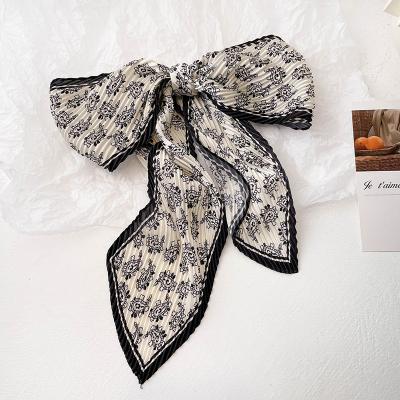 China Latest Fashion Feeling Neck Scarf Women Ethnic Style Crochet Hair Scarf Floral Print Pleated Silk Hair Bands Wholesale Flower Soft Smooth Cashew Long for sale