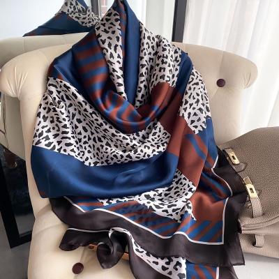 China Feeling leopard silk scarf 2022 new long color match color women hijabs satin ladies stoles scarves soft smooth custom silk printing luxury silk shawls for sale