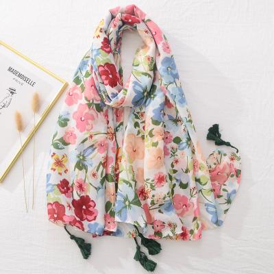 China New Arrival Ladies Flower Print Elegant Shawls Stoles Soft Smooth Feeling Soft Cotton Scarves For Women Summers Floral Print Beach Scarf With Tassel for sale