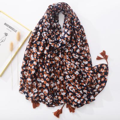 China Wholesale Viscous 2022 New Custom Spring Ladies Cotton Voile Hijab Scarf Tassels Muslim Women Fashion Arabic Black Flower Printed Hijabs for sale