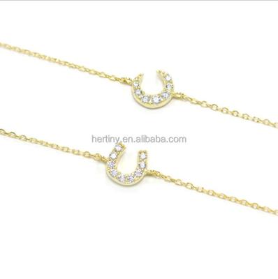 China Hertiny CLASSIC Jewellry Rhinestone S925 14K Gold Plated Sterling Silver Horseshoe Bracelet for Girl for sale