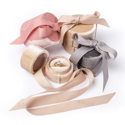 China Handmade Multi Shapes Custom Jewelry Box Round Pink Ring Box Packaging Velvet Wedding Ring Earrings Jewelery Packaging Box with Ribbon for sale