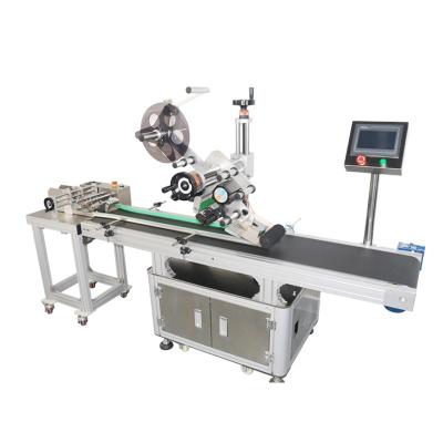 China Self Adhesive Label Applicator High Speed ​​Food Mailing Label Machine Table Top Flat Labeling Machines for sale