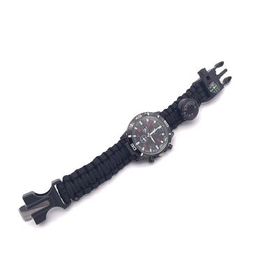 China Outdoor Survival Watch Umbrella Rope Braid, Firestick, Compass, Multifunctional Whistle A-W1 for sale