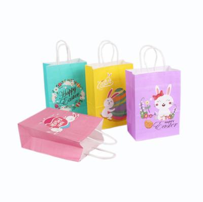 China Newest Customized Recyclable Easter Bunny Egg Design Gift Bag Kraft Paper Gift Bag With Twisted Paper Handle for sale