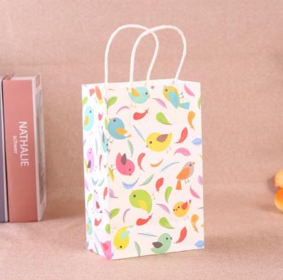 China Recyclable Luxury Design Kraft Paper Bag Bird Design Print Gift Bag Spring Wrapping Bag With Twisted Paper Handles Paper for sale