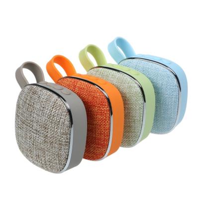 China New Wholesale Wireless Portable Speaker Small Wireless Home Outdoor Fabric USB Rechargeable Wireless Mini Speakers for sale